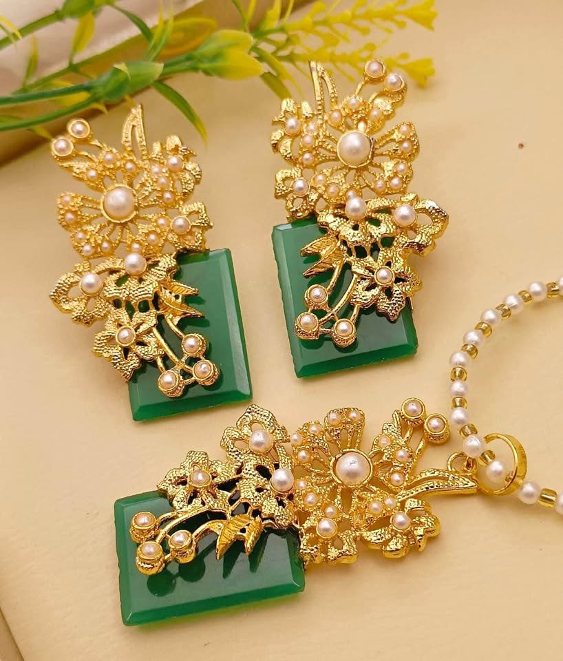 Ruby Pendant Set with Pearl and Floral Detailing
